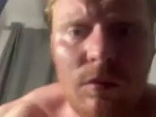 Play this HD video titled  muscleyredhead